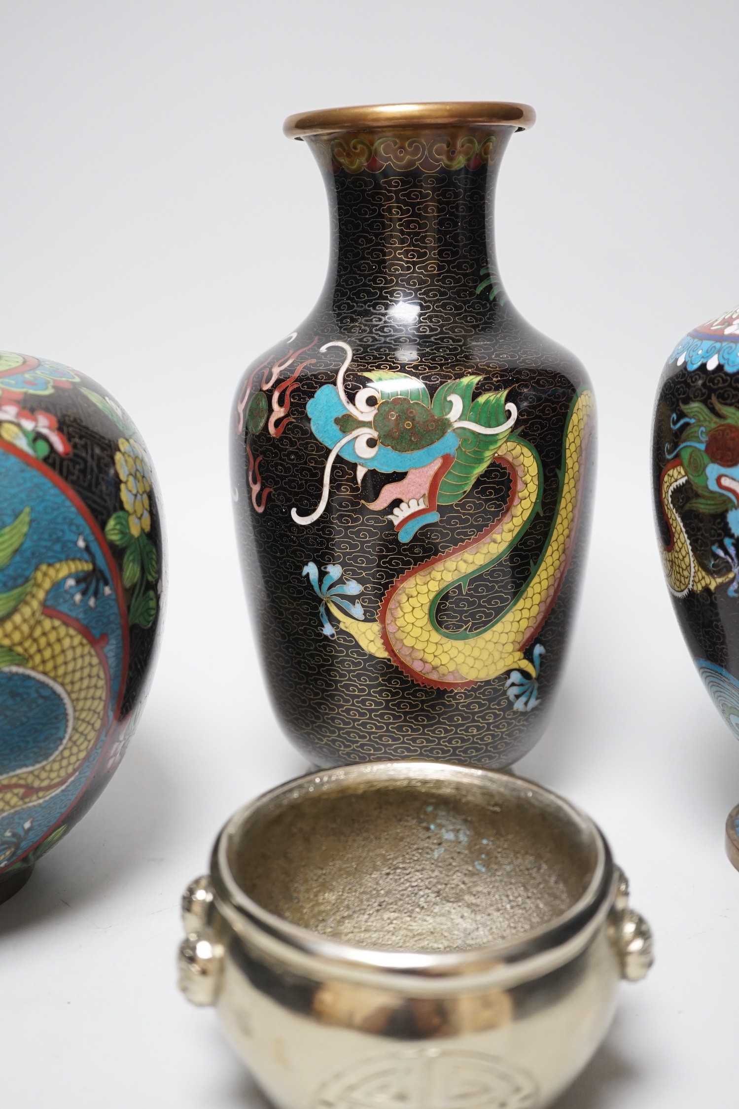 Three Chinese cloisonné enamel vases and a small bronze censer, Tallest 26cm